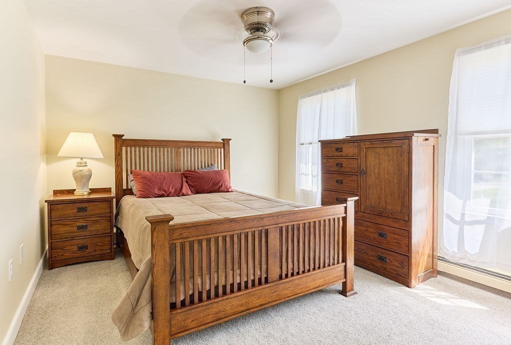 58 Buttercup Lane Hanover, MA 02339 - Photo 20 of 35 a bedroom with a bed and dresser