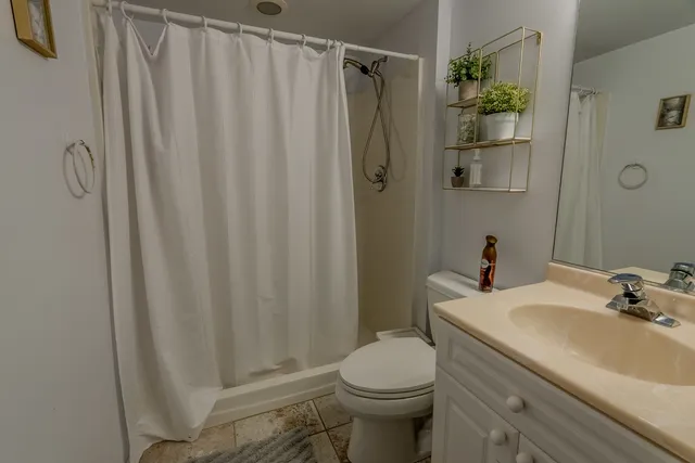 a view of a chairs and table in the patio