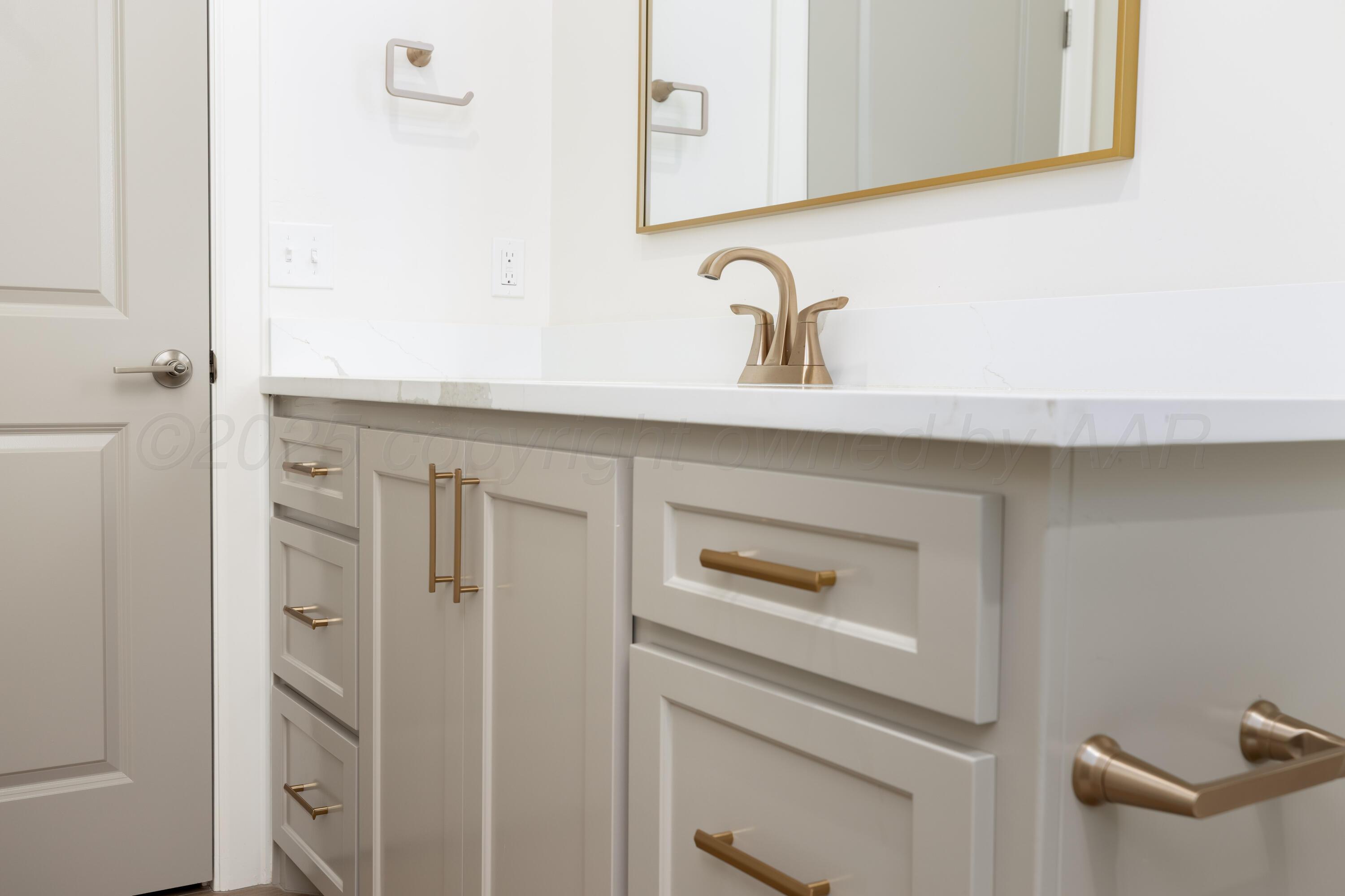 10251 Prickly Pear Road Amarillo, TX 79119 - Photo 24 of 30 a bathroom with a sink and a mirror
