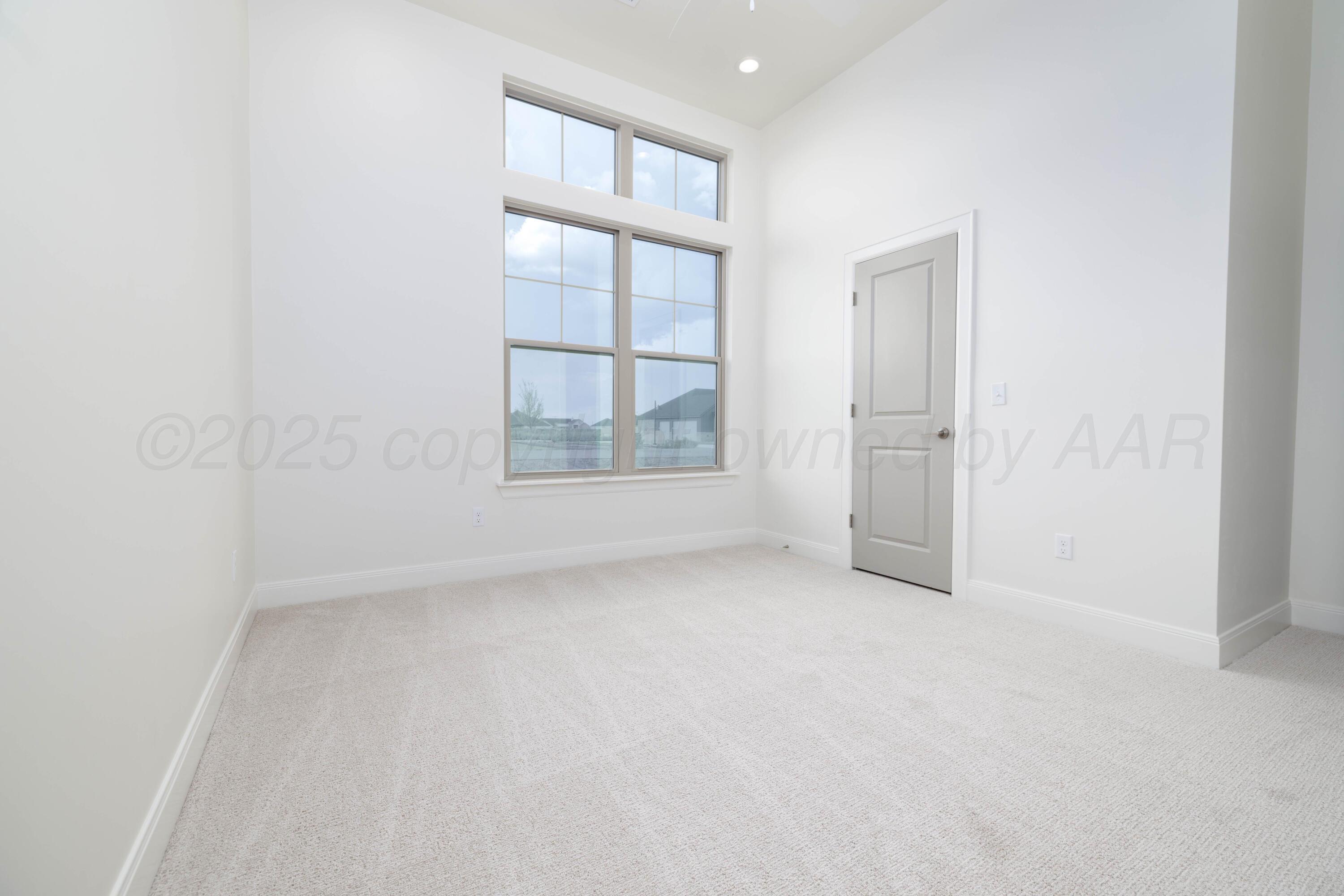 10251 Prickly Pear Road Amarillo, TX 79119 - Photo 26 of 30 an empty room with windows and closet