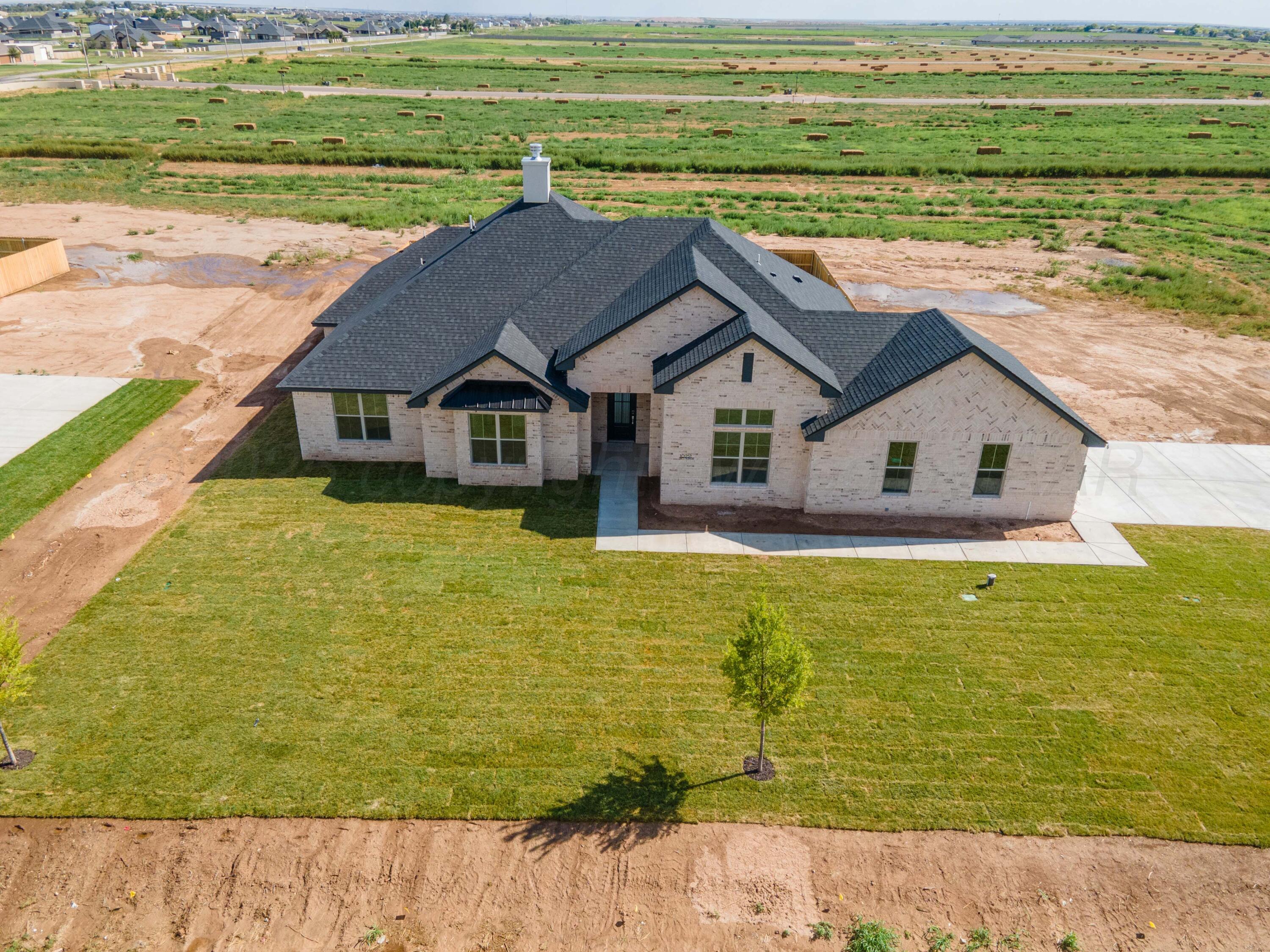10251 Prickly Pear Road Amarillo, TX 79119 - Photo 30 of 30 a view of a house with a ocean view