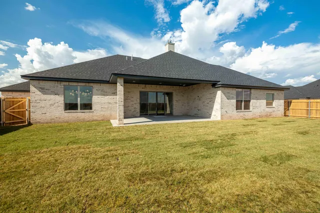 a house with a yard in front of it