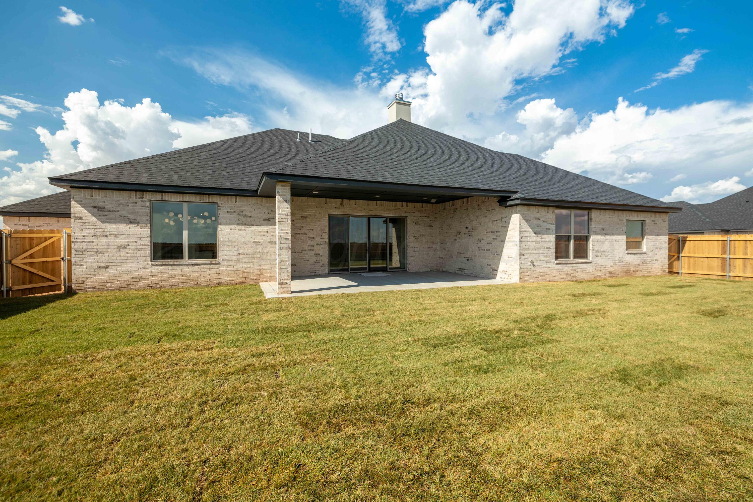 10251 Prickly Pear Road Amarillo, TX 79119 - Photo 6 of 30 a house with a yard in front of it