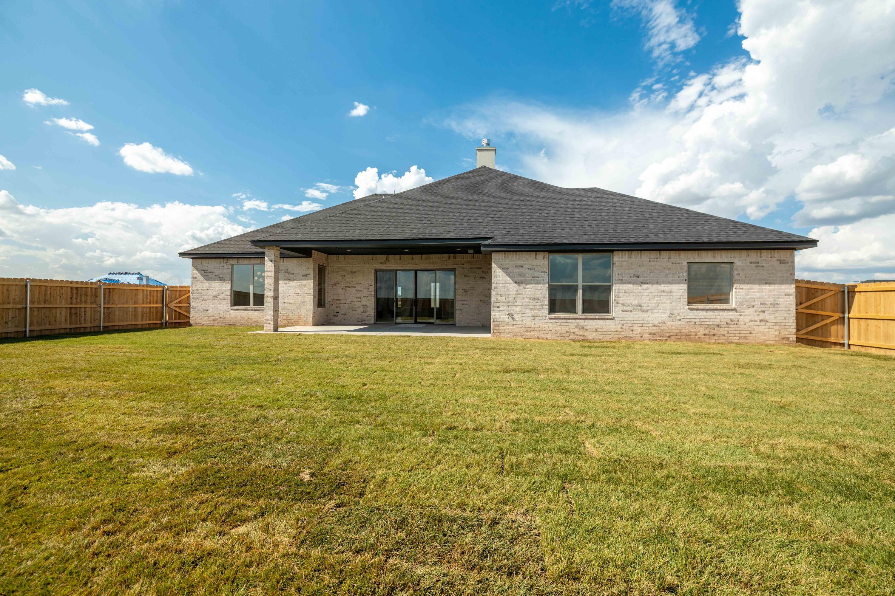 10251 Prickly Pear Road Amarillo, TX 79119 - Photo 7 of 30 a front view of a house with a garden