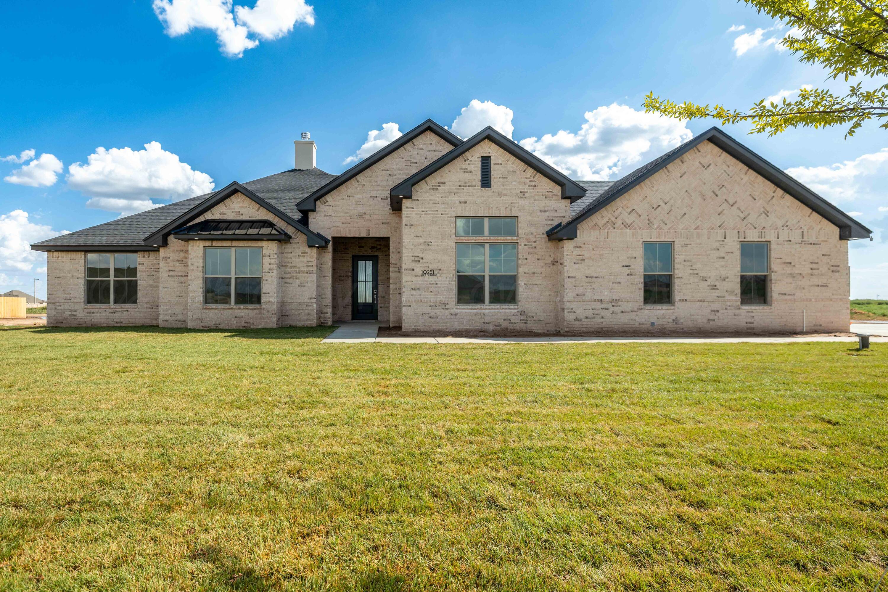 10251 Prickly Pear Road Amarillo, TX 79119 - Photo 9 of 30 a view of a house with a backyard