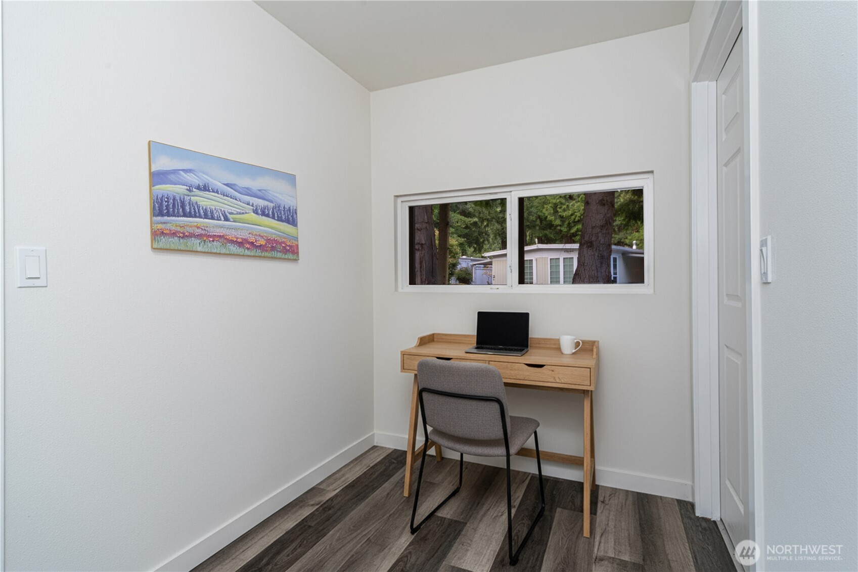 16300 Northeast State Highway, Unit 10 Poulsbo, WA 98370 - Photo 15 of 34 a view of a workspace with furniture and a window