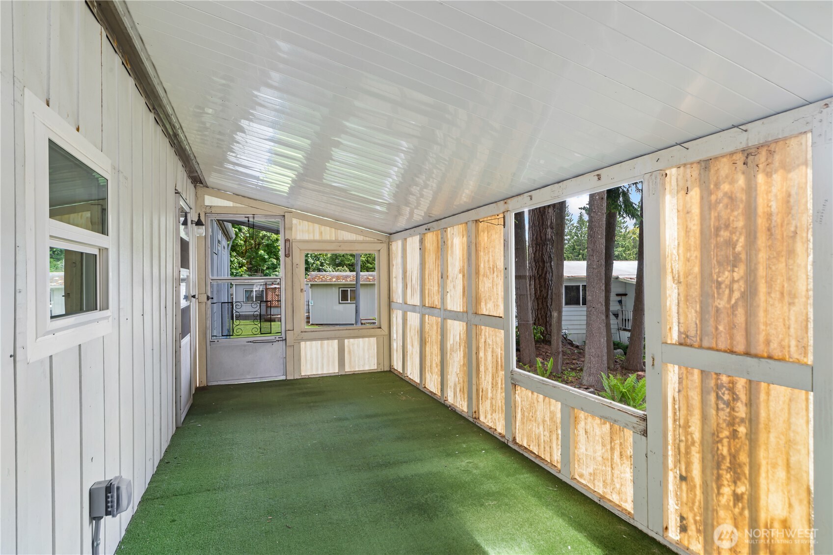 16300 Northeast State Highway, Unit 10 Poulsbo, WA 98370 - Photo 21 of 34 a view of an entryway with garden