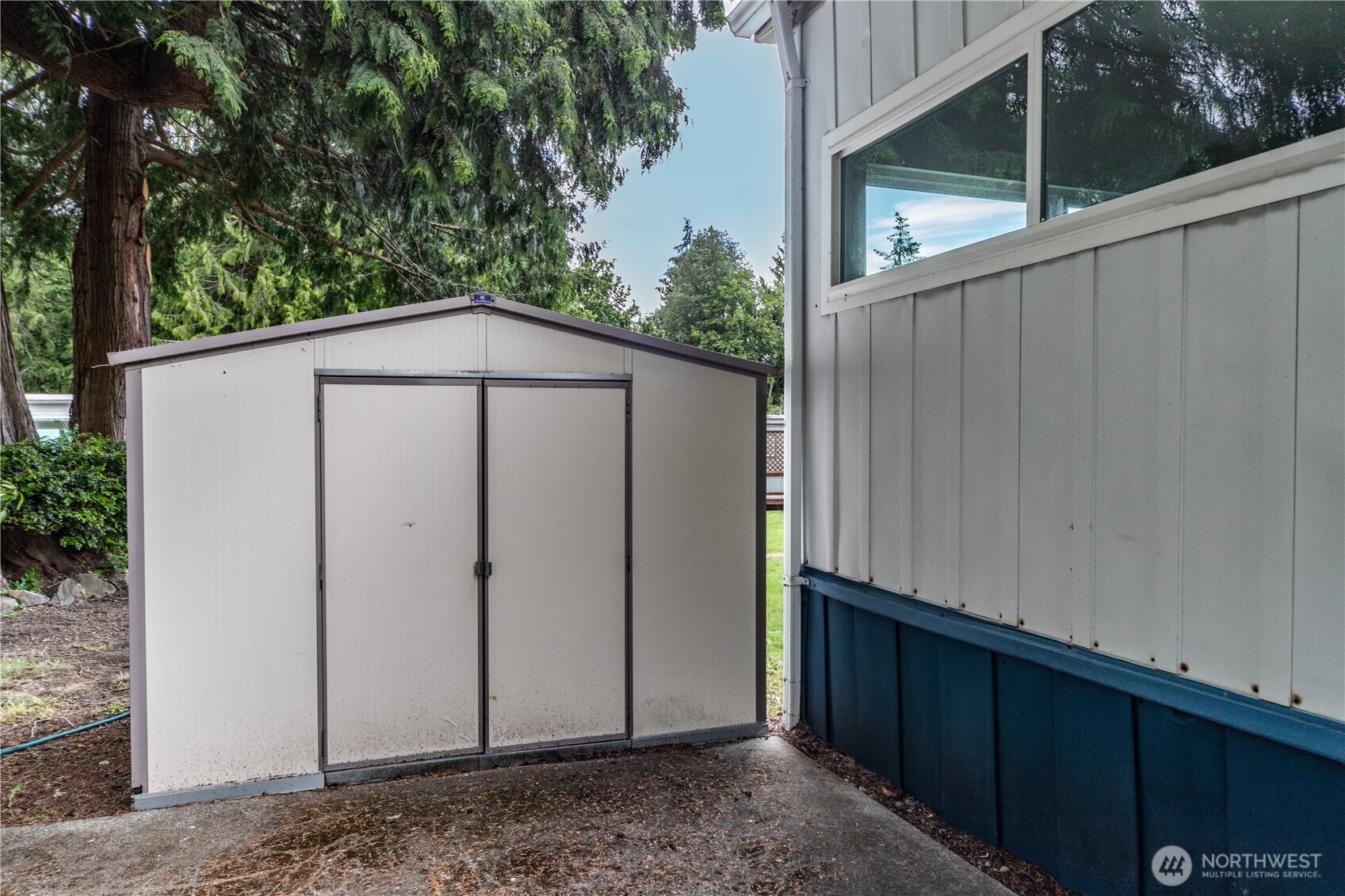 16300 Northeast State Highway, Unit 10 Poulsbo, WA 98370 - Photo 28 of 34 a backyard of a house