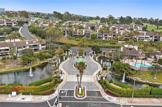 a view of a swimming pool with outdoor seating
