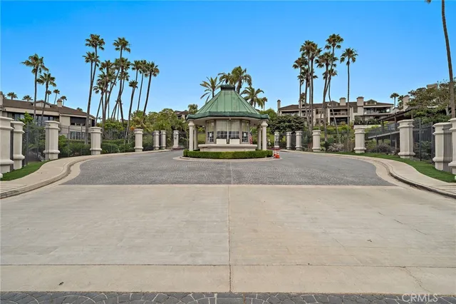 a view of a house with a yard and a garage