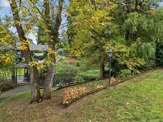 an aerial view of house with yard