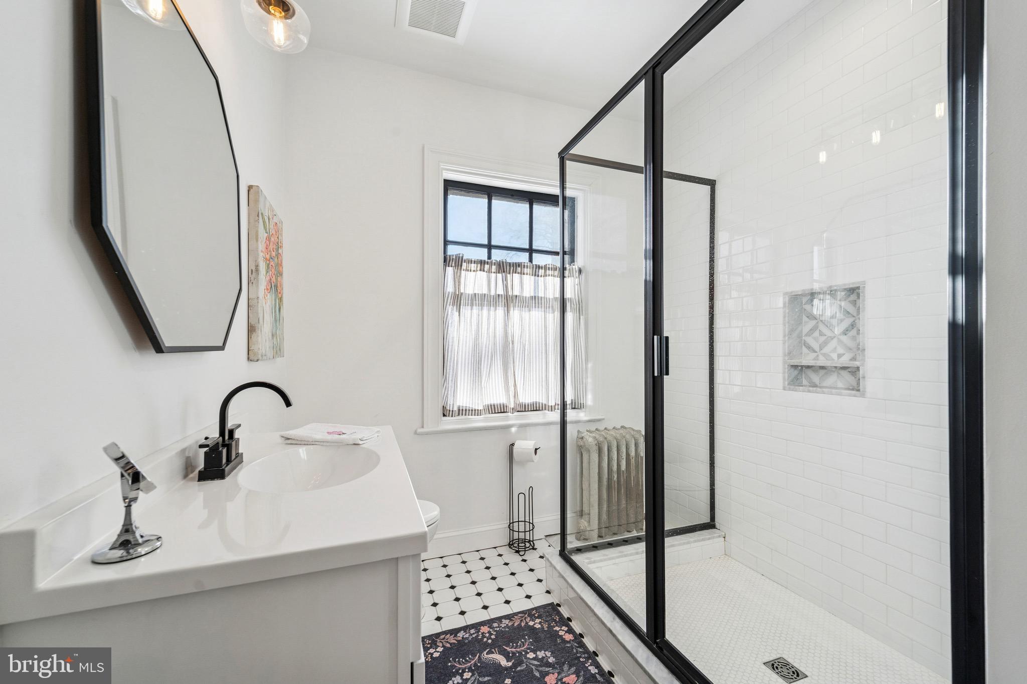1221 Church Road Wyncote, PA 19095 - Photo 29 of 51 a bathroom with a sink and a mirror