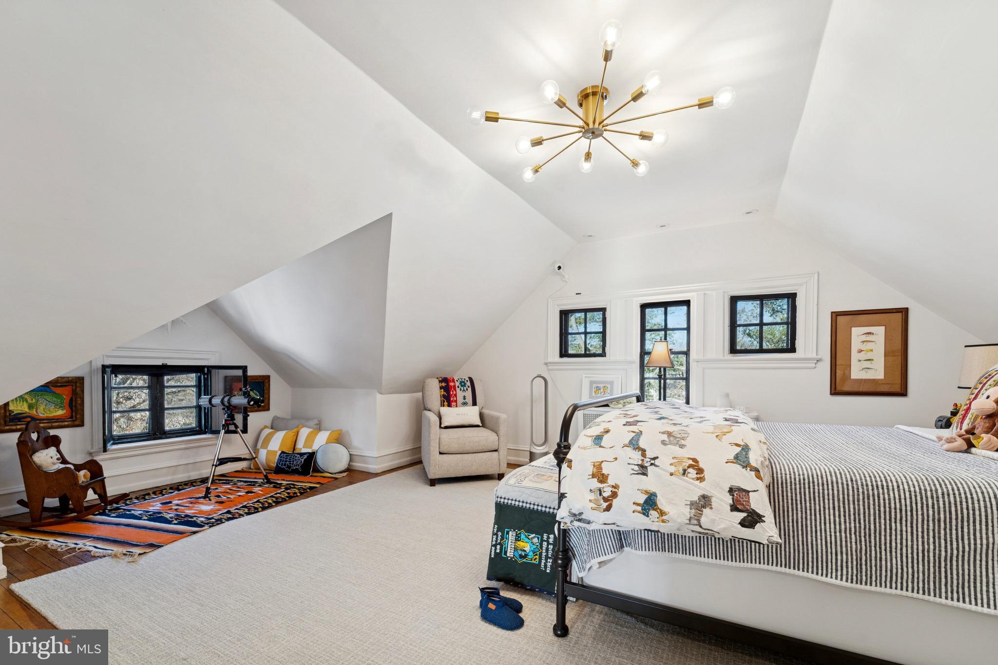 1221 Church Road Wyncote, PA 19095 - Photo 36 of 51 a bedroom with furniture and a chandelier