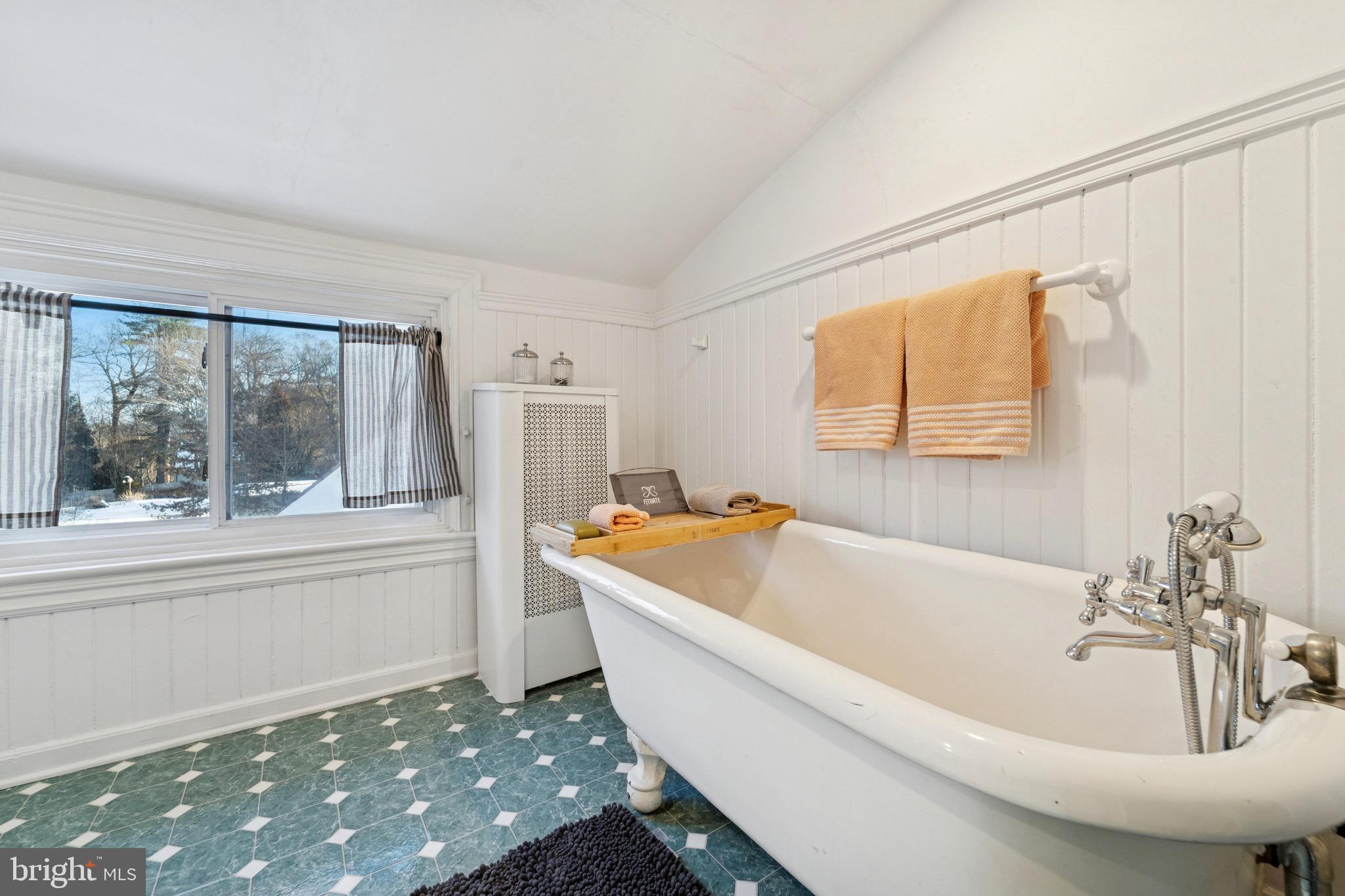 1221 Church Road Wyncote, PA 19095 - Photo 40 of 51 a bathroom with a bathtub and a sink
