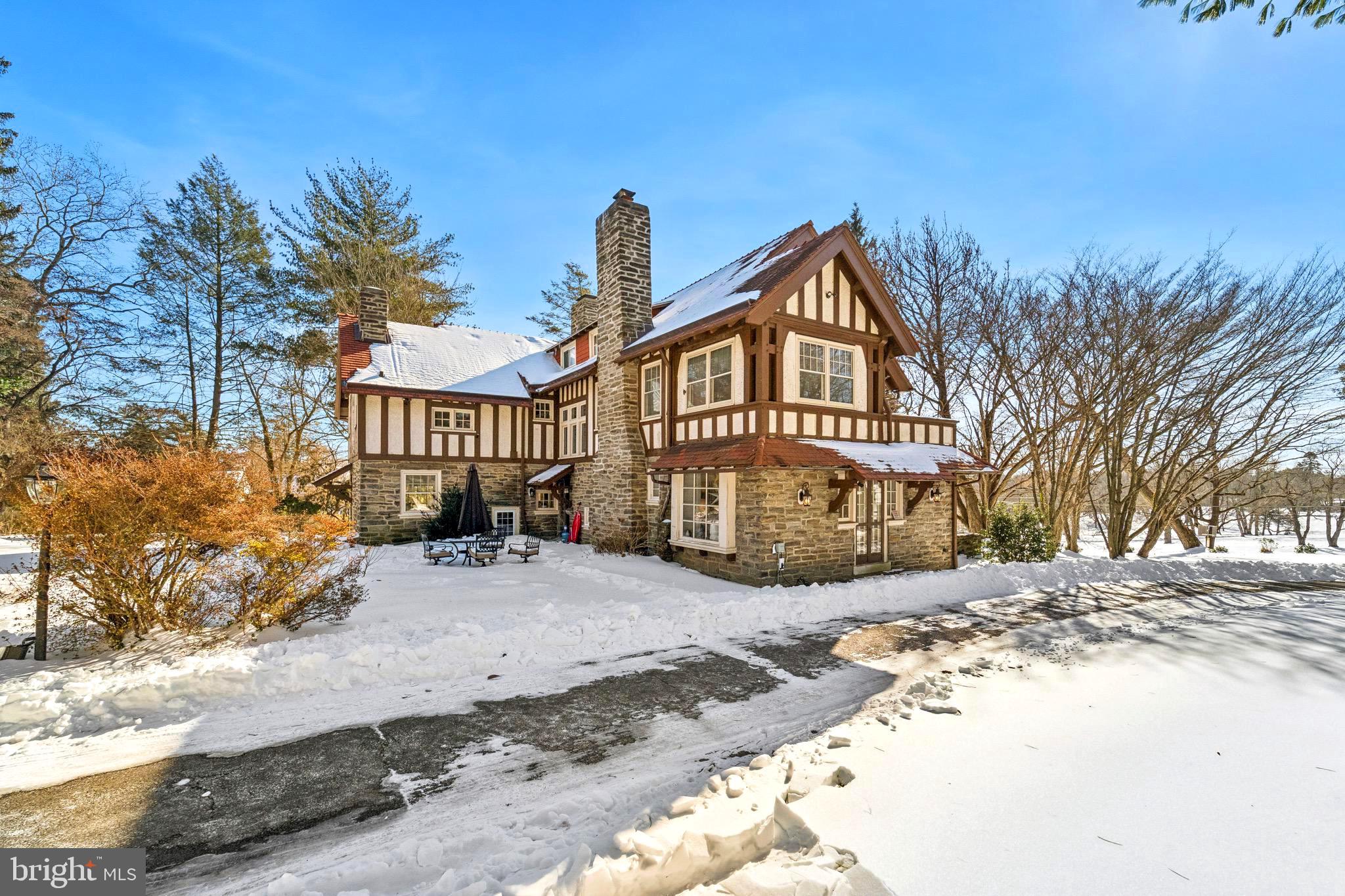 1221 Church Road Wyncote, PA 19095 - Photo 43 of 51 a view of a house with a yard covered in snow