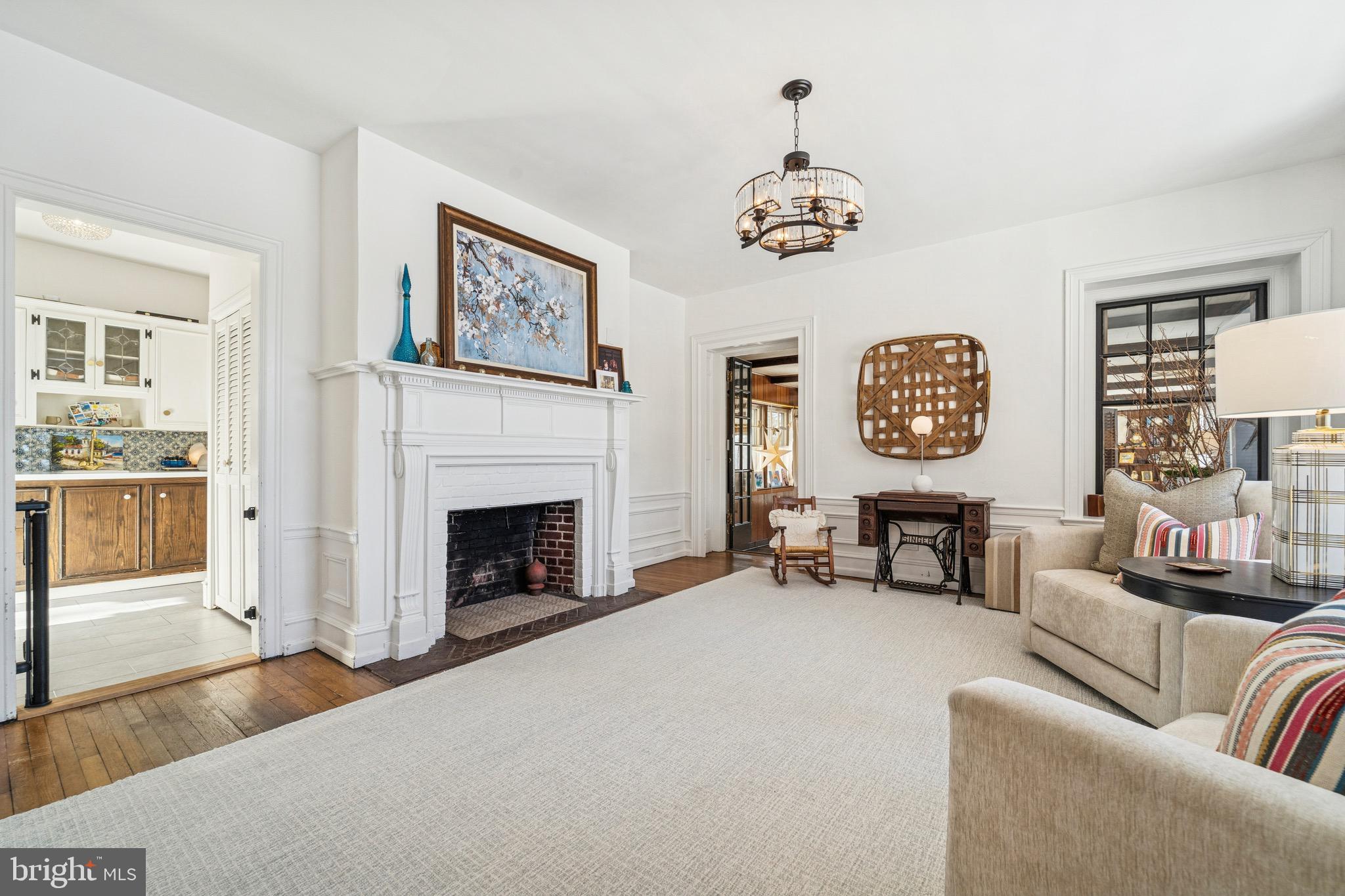 1221 Church Road Wyncote, PA 19095 - Photo 7 of 51 a living room with furniture and a fireplace