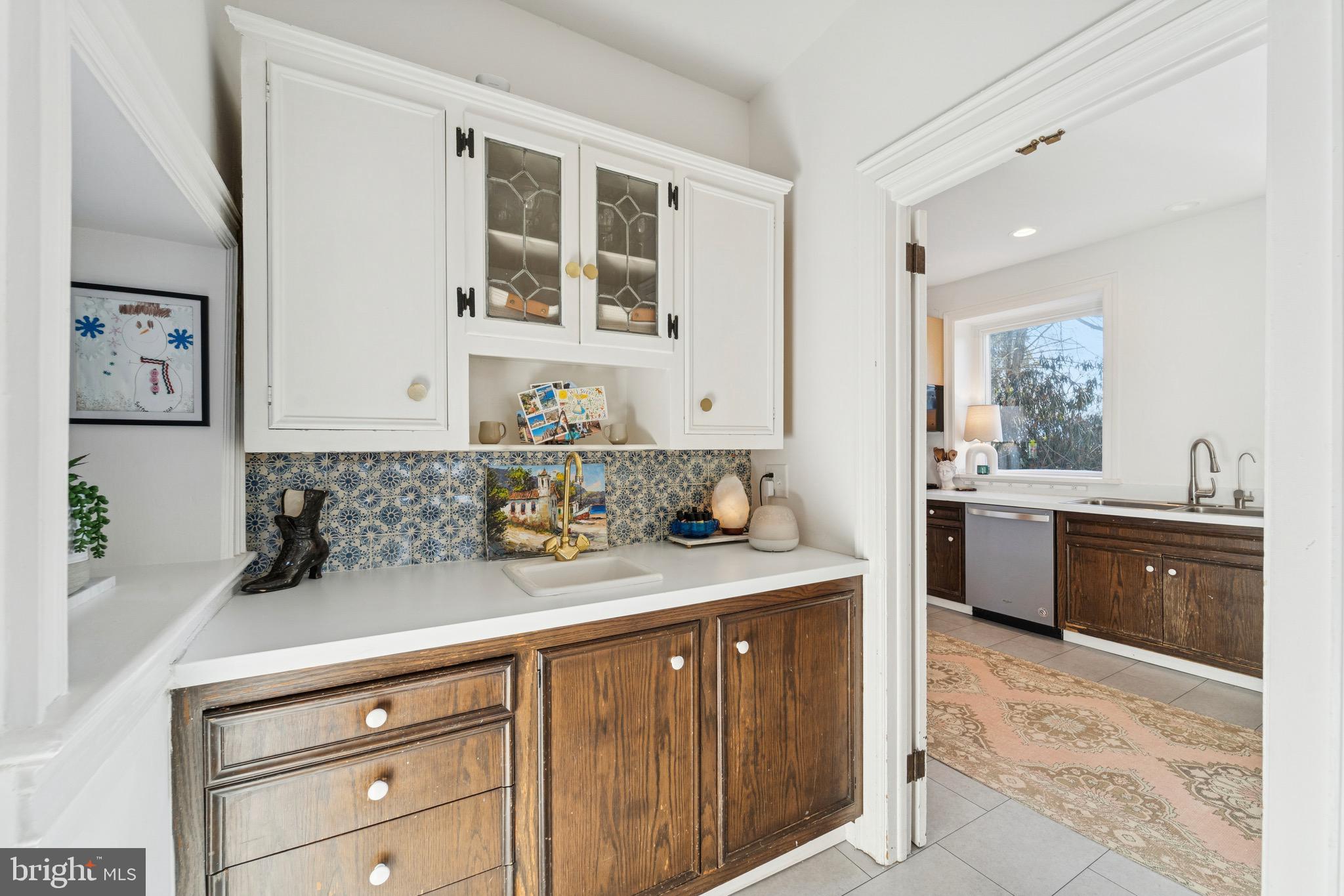 1221 Church Road Wyncote, PA 19095 - Photo 9 of 51 a spacious bathroom with a granite countertop sink a mirror and a
