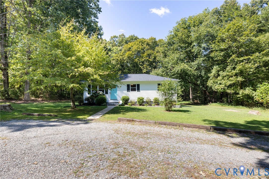 1722 Maidens Road Maidens, VA 23102 - Photo 1 of 21 View of front of house featuring a front lawn
