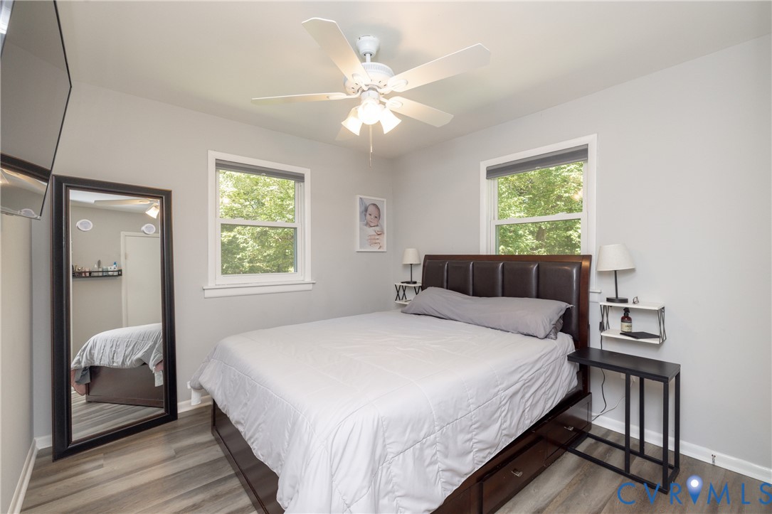 1722 Maidens Road Maidens, VA 23102 - Photo 12 of 21 Bedroom with wood finished floors and ceiling fan