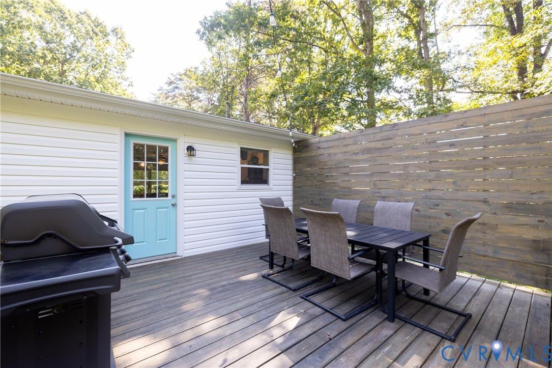 1722 Maidens Road Maidens, VA 23102 - Photo 17 of 21 Wooden terrace with outdoor dining space and grill