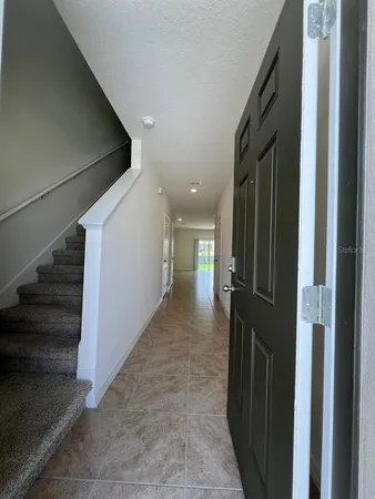 a view of hallway with stairs