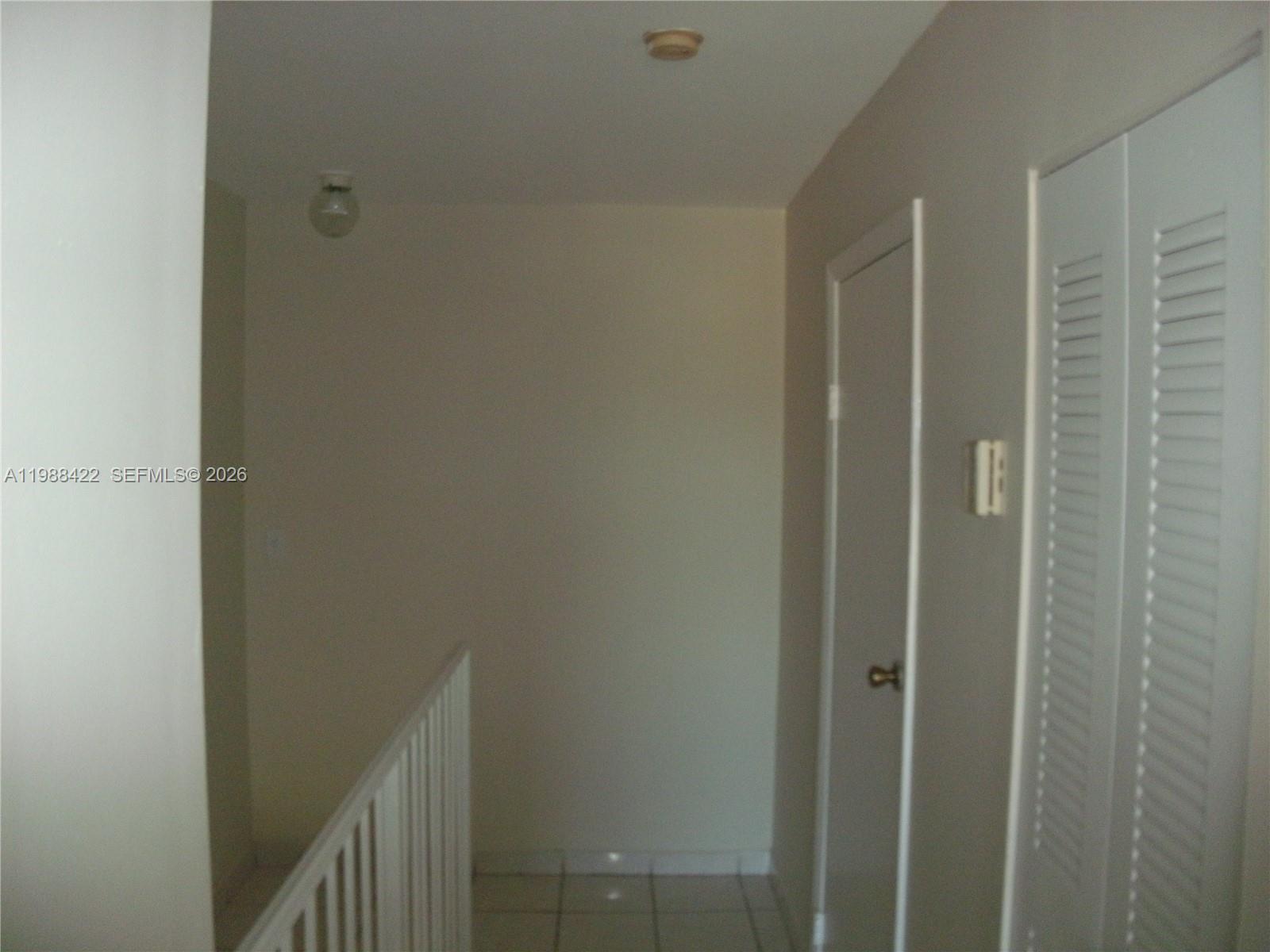 3901 Southwest 109th Avenue, Unit 6 Miami, FL 33165 - Photo 3 of 12 a view of a hallway