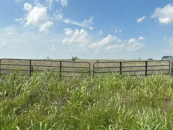 a view of outdoor space with lots of green space