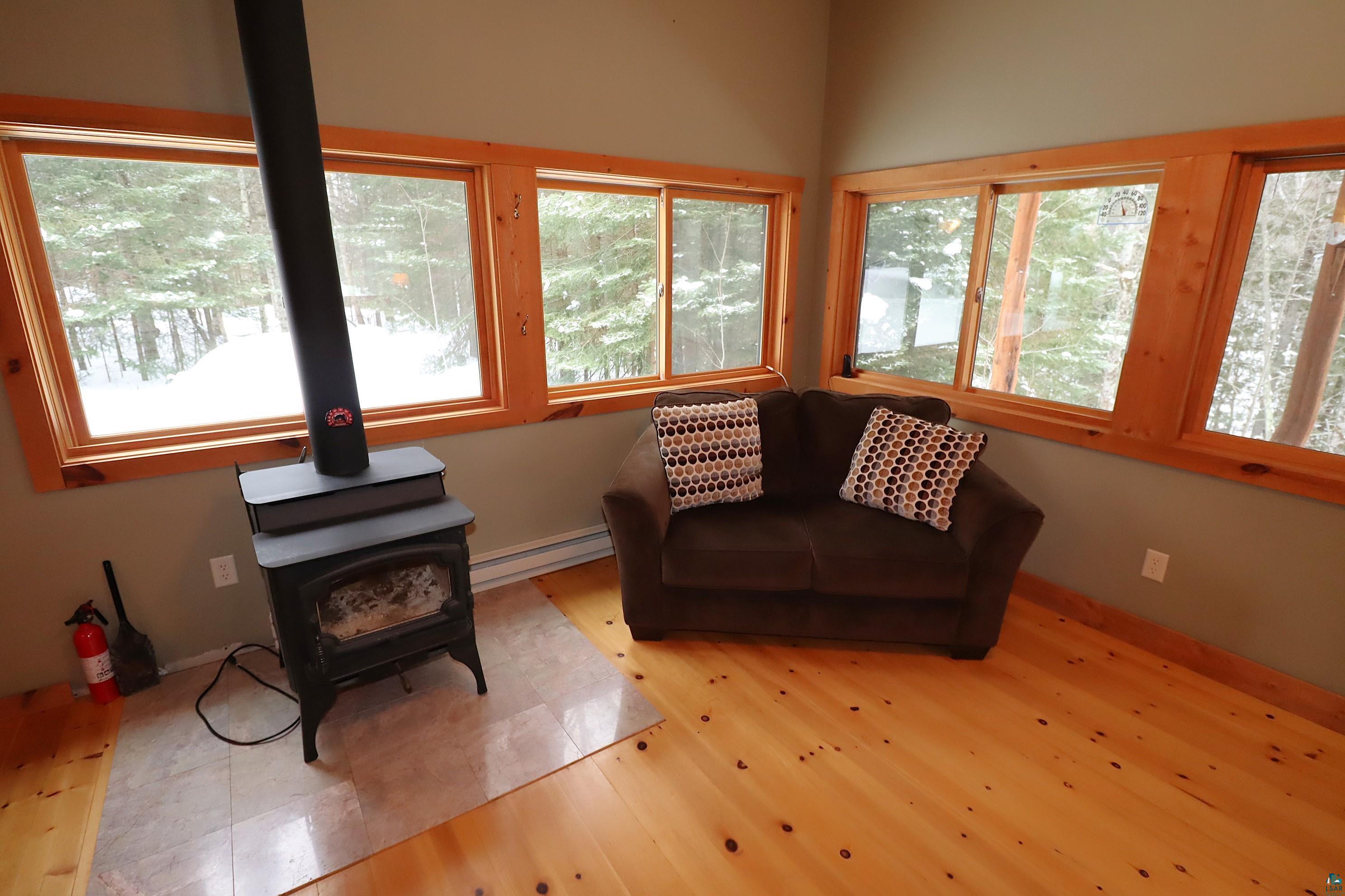 31715 Star Rte Road Bayfield, WI 54814 - Photo 26 of 63 Primary Bedroom Woodburning Stove