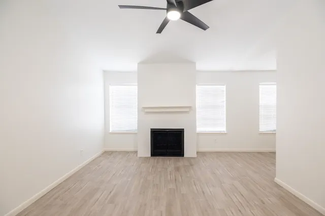 an empty room with windows