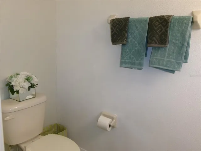 a bathroom with a toilet and a sink