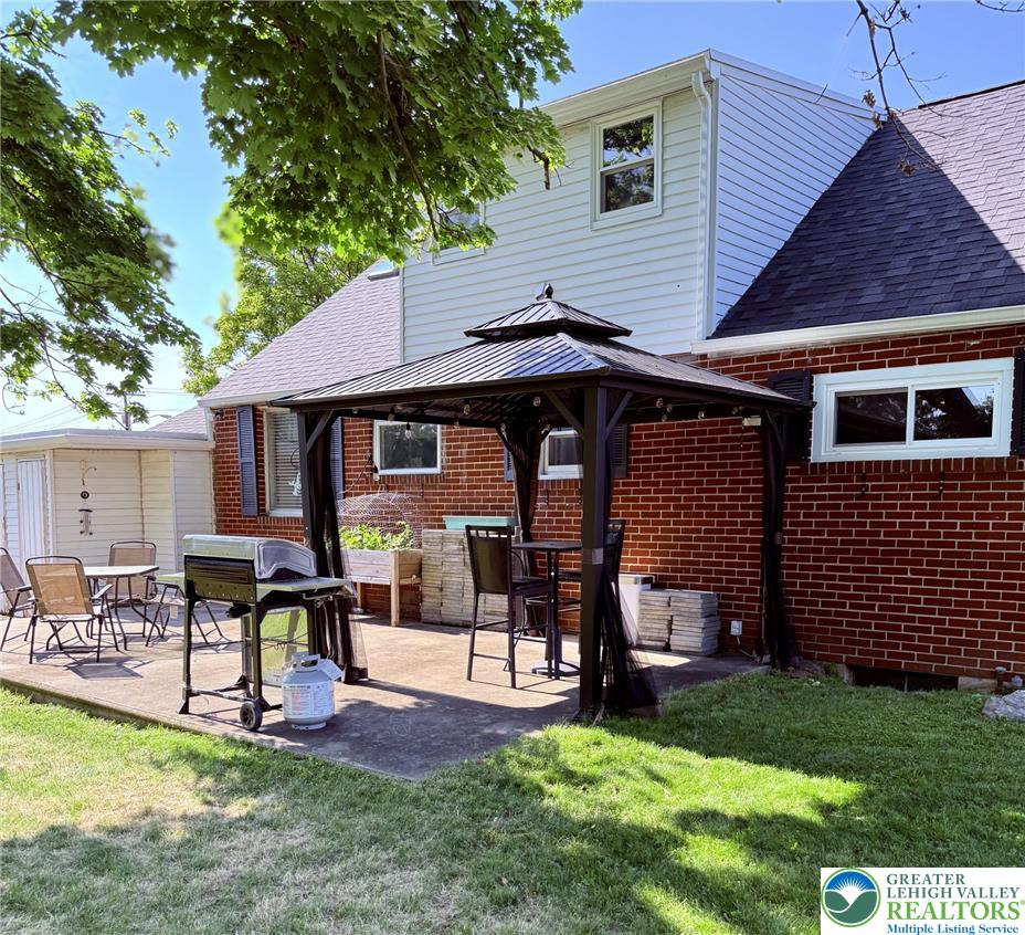 1275 Macada Road Bethlehem, PA 18017 - Photo 9 of 87 Enjoy outdoor living on this spacious patio, perfect for grilling and entertaining.