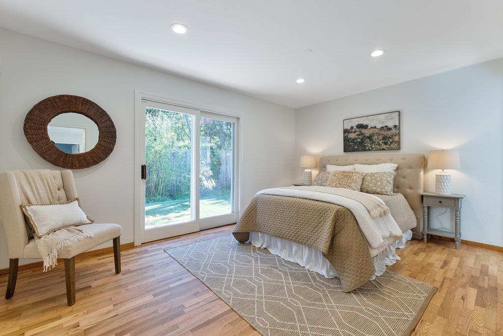 135 Baltusrol Drive Aptos, CA 95003 - Photo 16 of 32 a bedroom with a large bed and a window