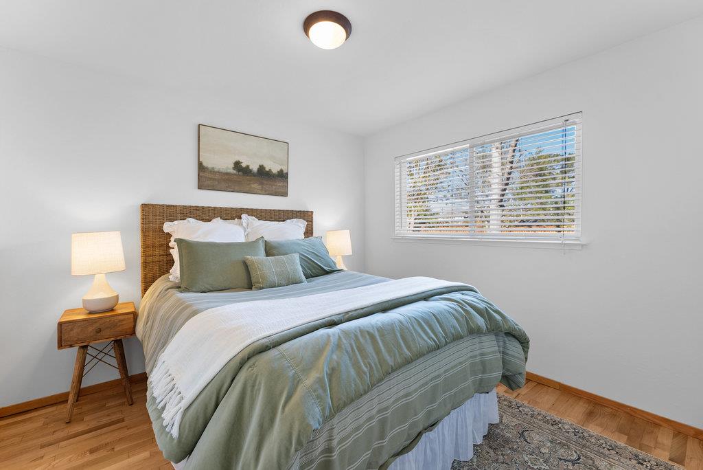 135 Baltusrol Drive Aptos, CA 95003 - Photo 17 of 32 a bedroom with a bed and a window