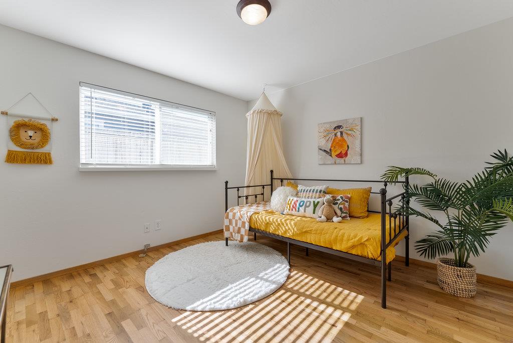 135 Baltusrol Drive Aptos, CA 95003 - Photo 18 of 32 a bedroom with a bed and a couch