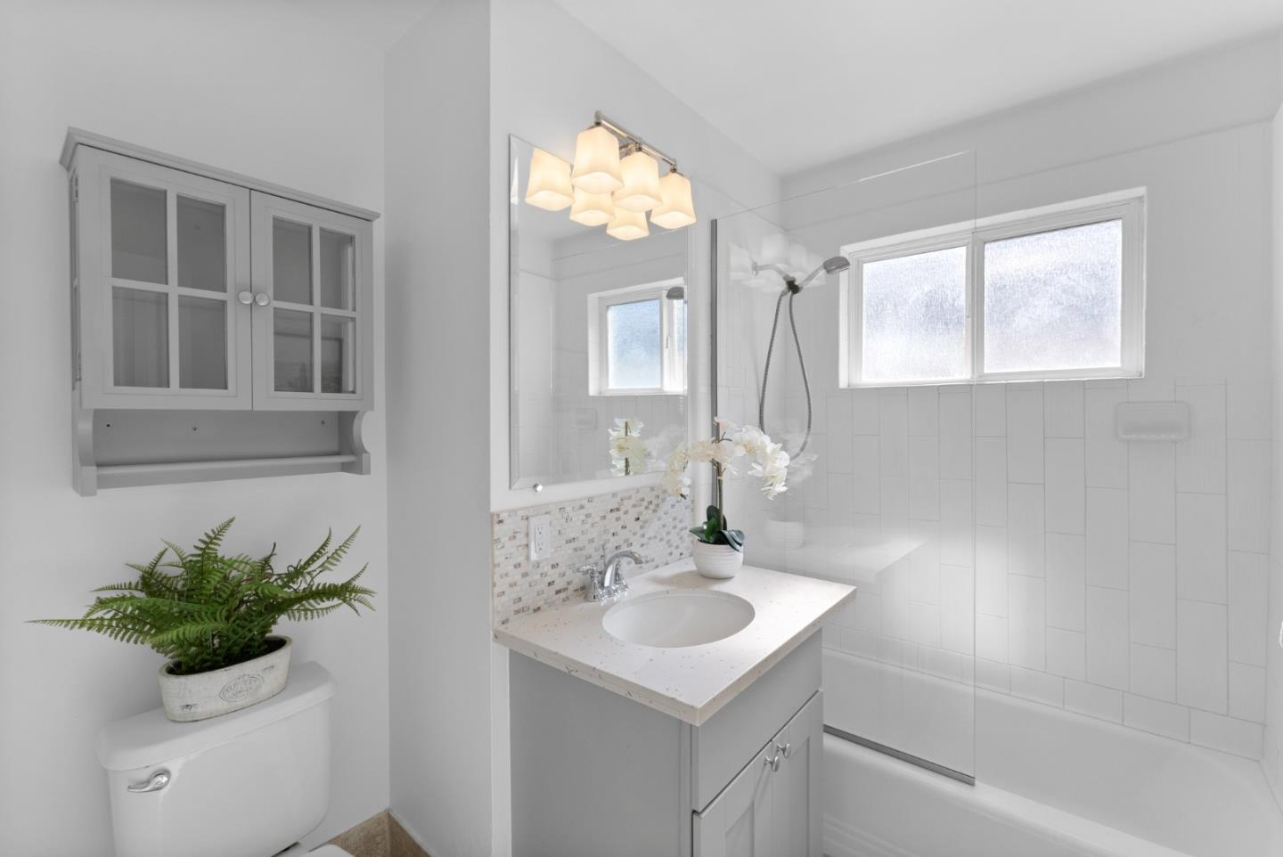 135 Baltusrol Drive Aptos, CA 95003 - Photo 21 of 32 a bathroom with a sink and a mirror