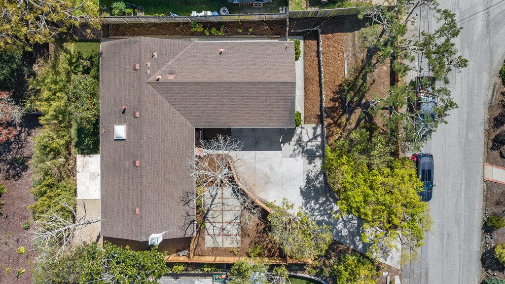 135 Baltusrol Drive Aptos, CA 95003 - Photo 31 of 32 an aerial view of a house with a yard and large trees