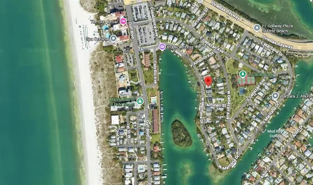 an aerial view of a house with outdoor space