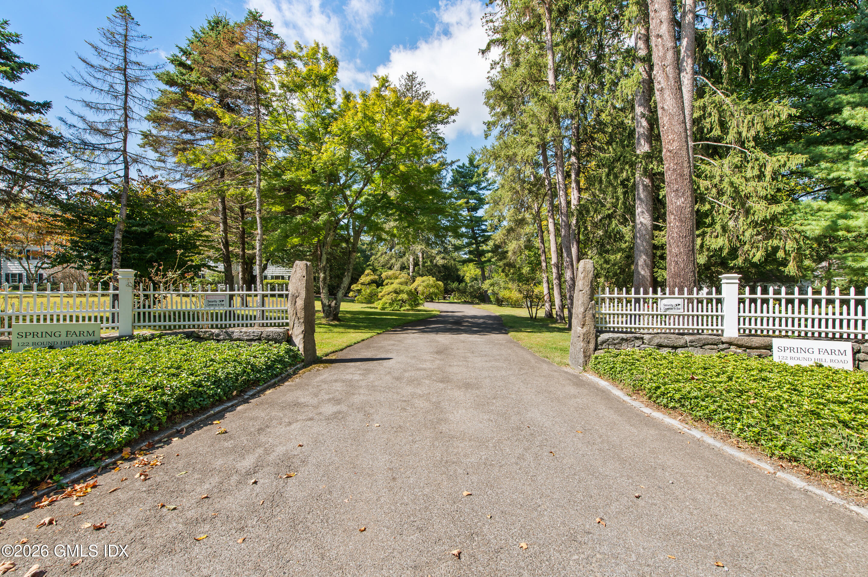 122 Round Hill Road Greenwich, CT 06831 - Photo 37 of 37 a view of a park with large trees