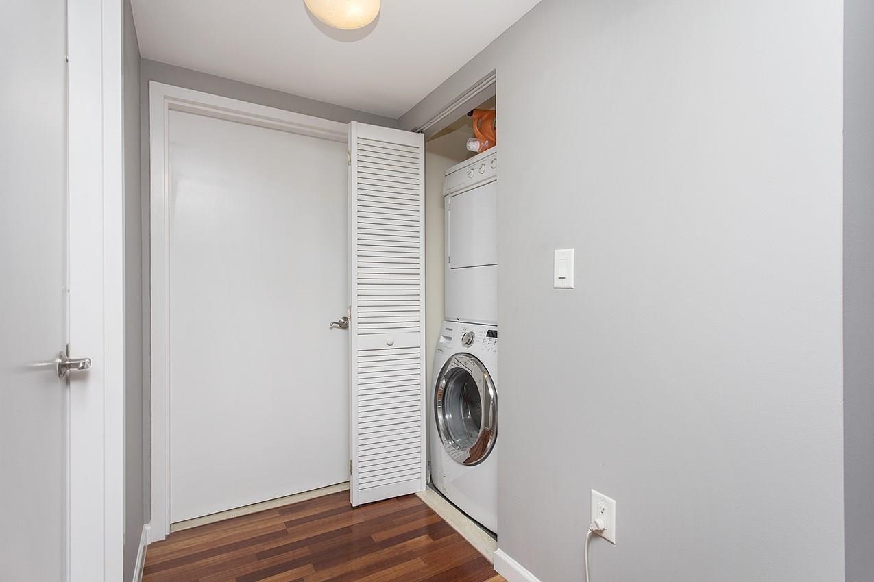 700 1st Street, Unit 4L Hoboken, NJ 07030 - Photo 3 of 9 a bathroom with a sink and a mirror