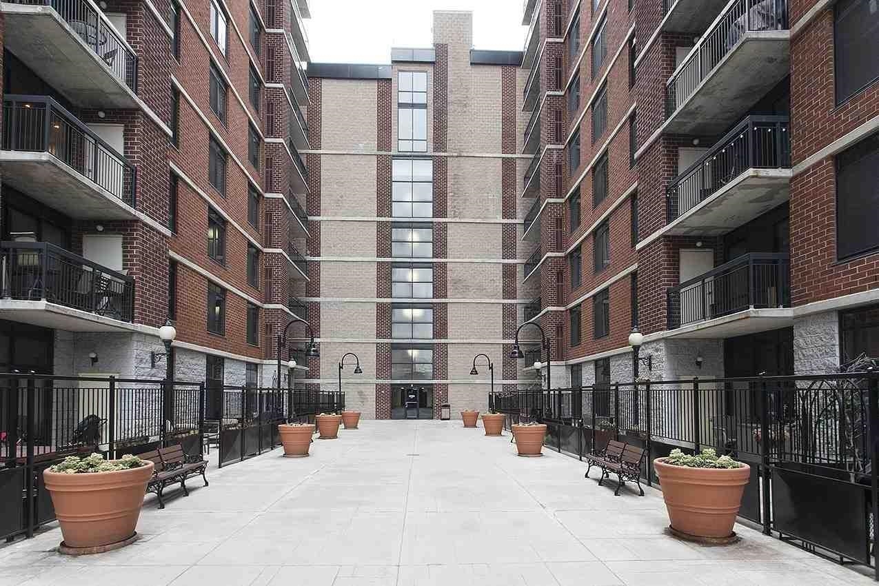 700 1st Street, Unit 4L Hoboken, NJ 07030 - Photo 9 of 9 a view of a building with a outdoor space