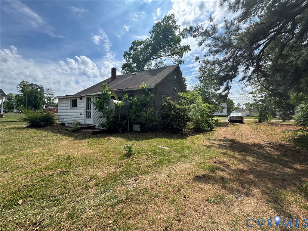303 Purdy Road Emporia, VA 23847 - Photo 5 of 18 a front view of a house with a yard