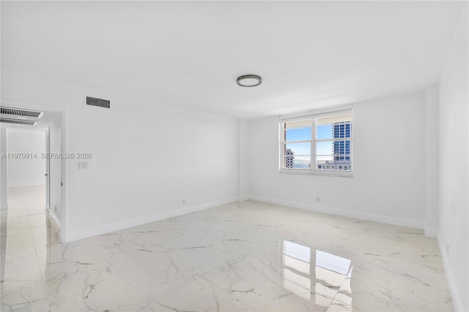 336 North Birch Road, Unit PH Fort Lauderdale, FL 33304 - Photo 24 of 68 a view of an empty room with a window