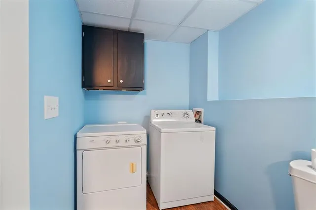 a utility room with dryer and washer