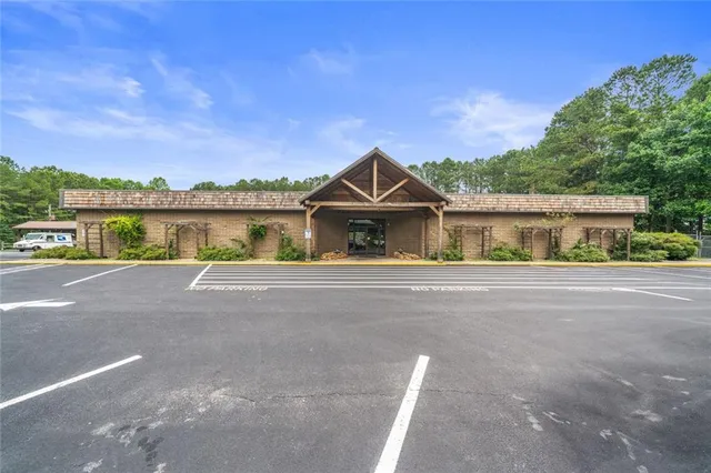 a view of house with a lake view