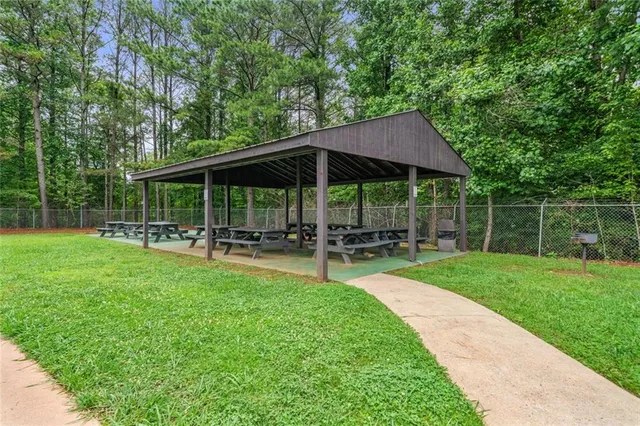 a view of a garden with a patio