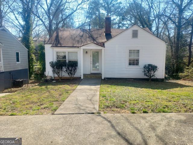 1746 Spring Avenue East Point, GA 30344 - Photo 1 of 1 a view of a house with a yard