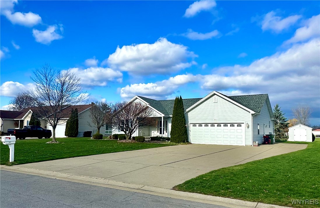 3851 Stone Ridge Wheatfield, NY 14120 - Photo 1 of 1 Extra wide concrete driveway.