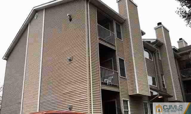 710 Edpas Road, Unit 710 New Brunswick, NJ 08901 - Photo 2 of 6 a view of a house with a white door
