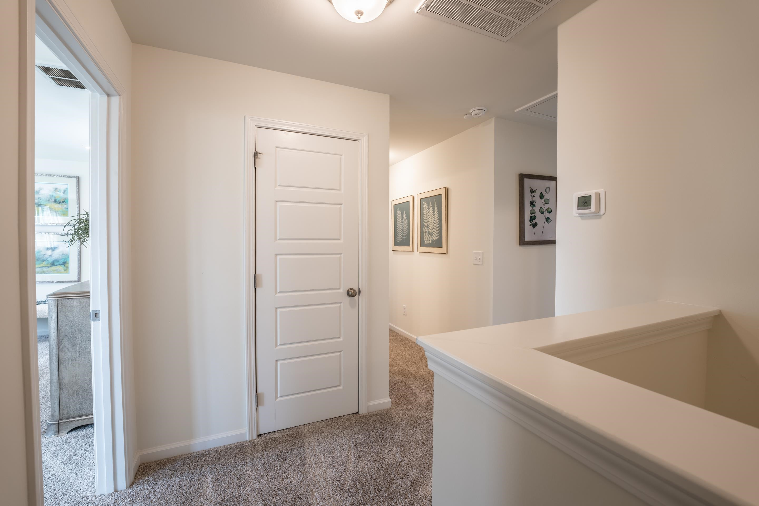 6517 Winter Spring Drive Wake Forest, NC 27587 - Photo 17 of 40 a view of a kitchen cabinets and wooden floor
