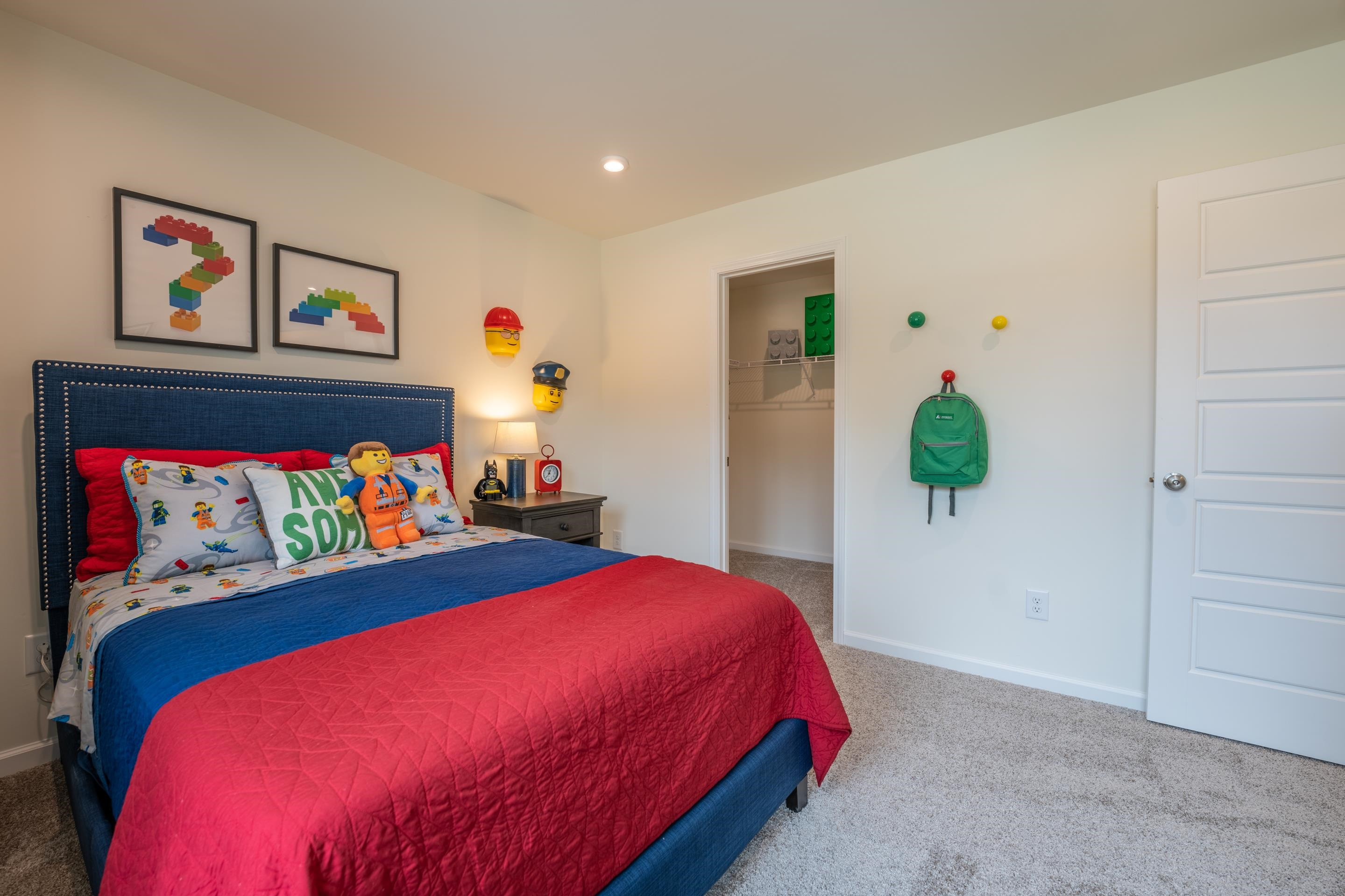 6517 Winter Spring Drive Wake Forest, NC 27587 - Photo 26 of 40 a bedroom with a bed and a painting on the wall